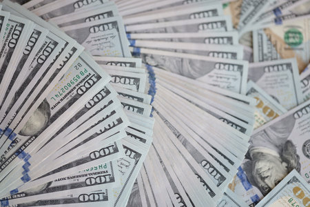Very big amount of US hundred dollar bills close up. Huge quantity of united states currency notes...