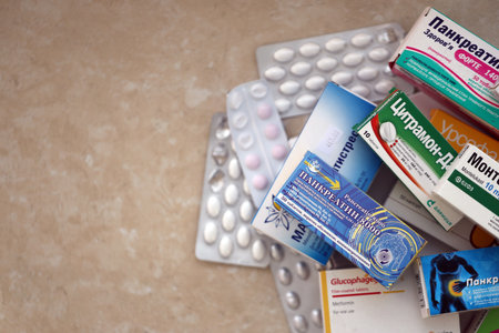 KYIV, UKRAINE - 4 MAY, 2023: Many boxes of pills and capsules stacked in pharmacy drug store close upのeditorial素材