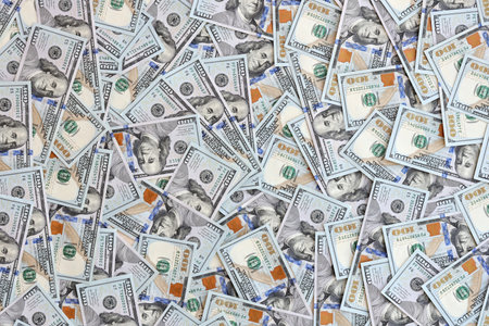 Very big amount of US hundred dollar bills close up. Huge quantity of united states currency notes...