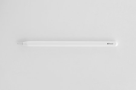 KYIV, UKRAINE - 4 MAY, 2023: New Apple pencil generation 2. Features a flat edge that attaches magnetically for automatic charging and pairing close upのeditorial素材