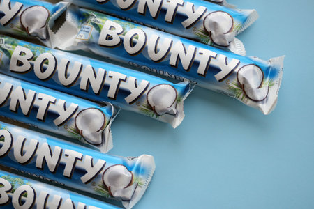 KYIV, UKRAINE - OCTOBER 31, 2023 Bounty chocolate bars with cocoa flavor filling. Bounty chocolate...