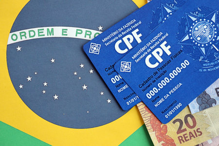 KYIV, UKRAINE - OCTOBER 31, 2023 Blue CPF card document template. The document guarantees authenticity and integrity in electronic communication between people in Brazil. Cadastro de Pessoa Fisicaのeditorial素材