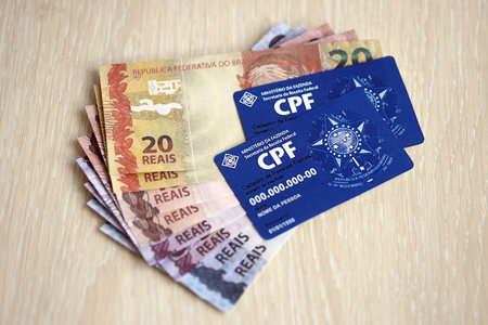 KYIV, UKRAINE - OCTOBER 31, 2023 Blue CPF card document template. The document guarantees authenticity and integrity in electronic communication between people in Brazil. Cadastro de Pessoa Fisicaのeditorial素材