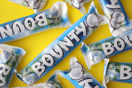 KYIV, UKRAINE - OCTOBER 31, 2023 Bounty chocolate bars with cocoa flavor filling. Bounty chocolate bar is a brand of American Mars Inc companyのeditorial素材