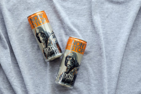 KYIV, UKRAINE - OCTOBER 31, 2023 Non Stop energy drink with limited edition design of Stalker and character with gas mask on aluminium tin can close upのeditorial素材