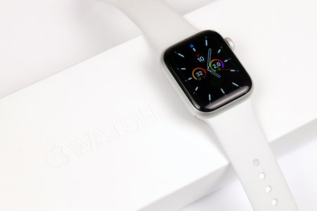 KYIV, UKRAINE - 4 MAY, 2023: Apple Watch series five 5 on white background close upのeditorial素材