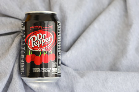 KYIV, UKRAINE - 4 MAY, 2023: Dr Pepper cherry drink black cans close upのeditorial素材