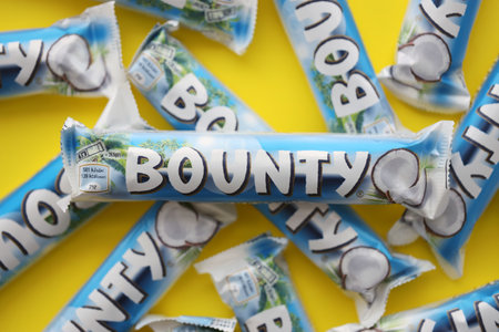 KYIV, UKRAINE - OCTOBER 31, 2023 Bounty chocolate bars with cocoa flavor filling. Bounty chocolate...