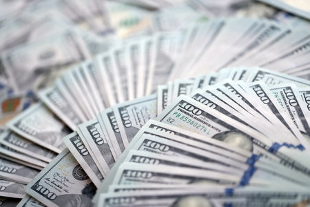 Very big amount of US hundred dollar bills close up. Huge quantity of united states currency notes...
