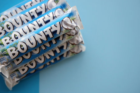 KYIV, UKRAINE - OCTOBER 31, 2023 Bounty chocolate bars with cocoa flavor filling. Bounty chocolate bar is a brand of American Mars Inc companyのeditorial素材