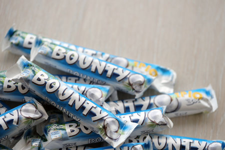KYIV, UKRAINE - OCTOBER 31, 2023 Bounty chocolate bars with cocoa flavor filling. Bounty chocolate...