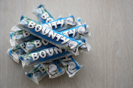 KYIV, UKRAINE - OCTOBER 31, 2023 Bounty chocolate bars with cocoa flavor filling. Bounty chocolate...