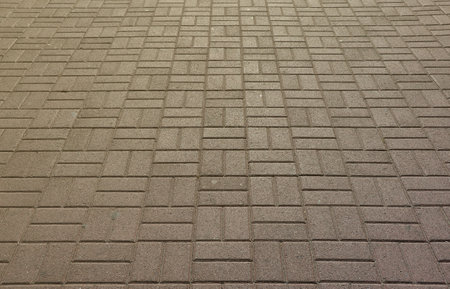 Photo of the site of a long and old worn paving slab