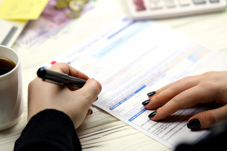 KYIV, UKRAINE - OCTOBER 31, 2023 Accountant fill french tax form 10963 Value added tax and similar taxes in end of tax period. Taxation and paperwork routine in Franceのeditorial素材