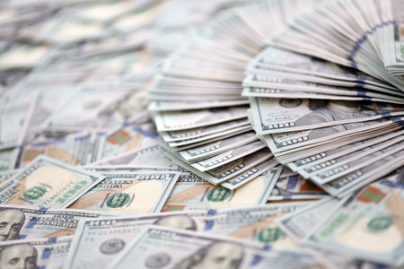 Very big amount of US hundred dollar bills close up. Huge quantity of united states currency notes...