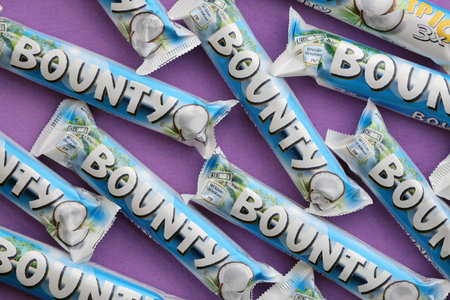 KYIV, UKRAINE - OCTOBER 31, 2023 Bounty chocolate bars with cocoa flavor filling. Bounty chocolate bar is a brand of American Mars Inc companyのeditorial素材