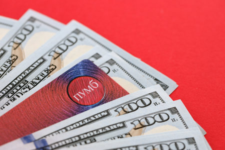 TERNOPIL, UKRAINE - JULY 7, 2023 Bank Card of PUMB Ukrainian Bank FUIB with red logo close upのeditorial素材