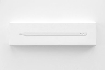 KYIV, UKRAINE - 4 MAY, 2023: New Apple pencil generation 2. Features a flat edge that attaches magnetically for automatic charging and pairing close upのeditorial素材
