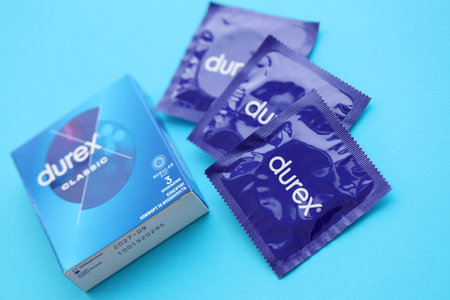 KYIV, UKRAINE - NOVEMBER 27, 2023 Durex blue condoms pack with logo close upのeditorial素材