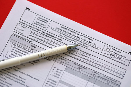 Indonesian tax form notification letter SPT for final income tax period article 4 paragraph 2 on accountant tableの写真素材