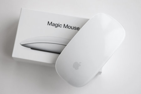 KYIV, UKRAINE - NOVEMBER 27, 2023 Apple Magic Mouse 3rd generation lies on white background close upのeditorial素材