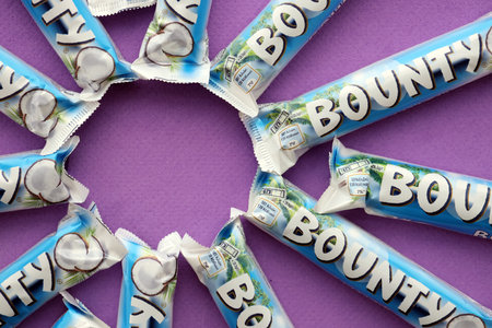 KYIV, UKRAINE - OCTOBER 31, 2023 Bounty chocolate bars with cocoa flavor filling. Bounty chocolate...