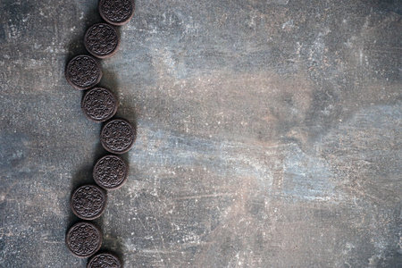 KYIV, UKRAINE - 4 MAY, 2023: Oreo double creme sandwich cookies with cream filling close up on dark...
