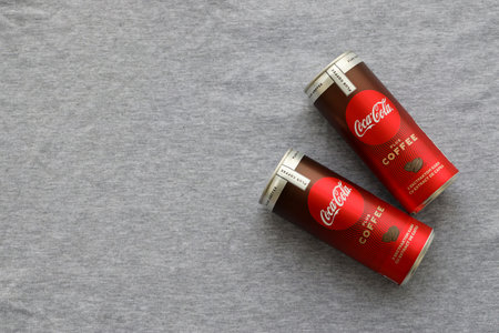 KYIV, UKRAINE - OCTOBER 31, 2023 Can of Coca Cola with coffee flavor. Closed tin can of drink with...