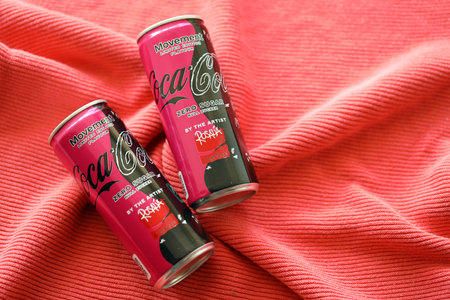 KYIV, UKRAINE - JULY 7, 2023 Coca-Cola zero sugar can with Rosalia design limited edition on red...