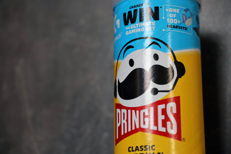 KYIV, UKRAINE - 4 MAY, 2023: Pringles tube of chips with rare classic paprika flavour close up