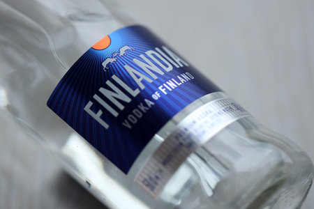 KYIV, UKRAINE - FEBRUARY 27, 2024 Bottle of famous Finlandia vodka alcohol drink on table close upのeditorial素材
