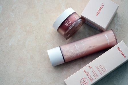 KYIV, UKRAINE - NOVEMBER 27, 2023 Hyatt Kombucha face skin tea-tox cream and toner bottle of Medipeel brand close upのeditorial素材