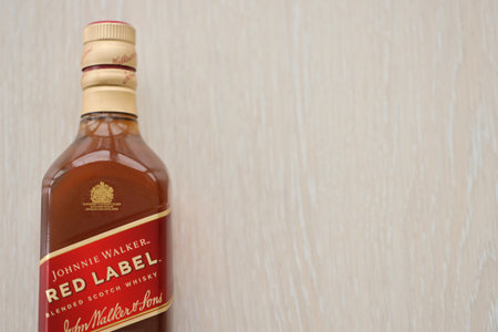 KYIV, UKRAINE - NOVEMBER 27, 2023 Johnnie Walker is the most widely distributed brand of blended Scotch whisky in the world with sales of over 130 million bottles a yearのeditorial素材