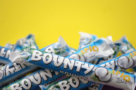 KYIV, UKRAINE - OCTOBER 31, 2023 Bounty chocolate bars with cocoa flavor filling. Bounty chocolate bar is a brand of American Mars Inc companyのeditorial素材