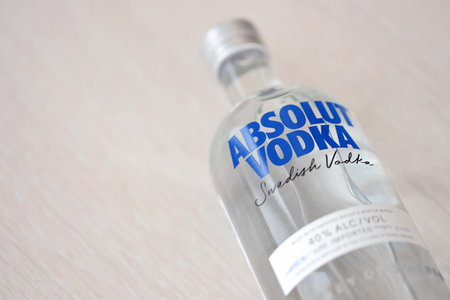 KYIV, UKRAINE - NOVEMBER 27, 2023 Absolut Vodka bottle produced near Ahus, Sweden. Owned by French group Pernod Ricard it is one of the largest brand of alcoholic spiritsのeditorial素材