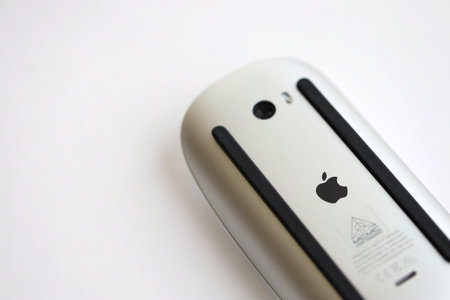 KYIV, UKRAINE - NOVEMBER 27, 2023 Apple Magic Mouse 3rd generation lies on white background close upのeditorial素材