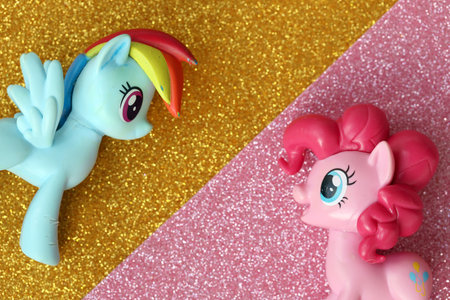 TERNOPIL, UKRAINE - JULY 7, 2023 Old toy with character from My Little Pony MLP cartoon TV show on bright shiny glitter background close upのeditorial素材