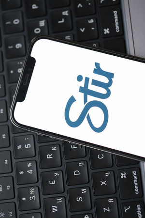 KYIV, UKRAINE - FEBRUARY 23, 2024 Stir logo of famous dating website or app on iPhone display screen close upのeditorial素材