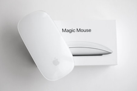 KYIV, UKRAINE - NOVEMBER 27, 2023 Apple Magic Mouse 3rd generation lies on white background close upのeditorial素材