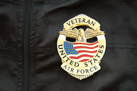 KYIV, UKRAINE - MARCH 9, 2024 US Air Force Veteran badge on black jacket uniform close upのeditorial素材