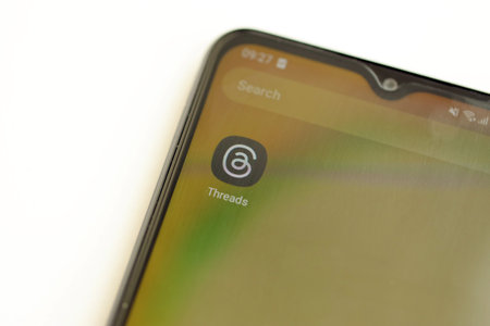 KYIV, UKRAINE - JULY 7, 2023 Threads by Meta application on display of Samsung smartphone on tableのeditorial素材