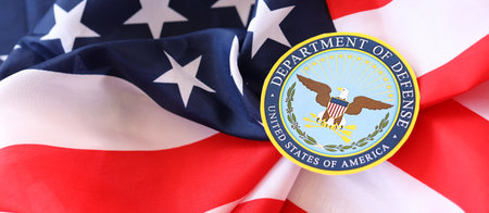 KYIV, UKRAINE - MARCH 9, 2024 US Department of Defense seal on United States of America flag close upのeditorial素材