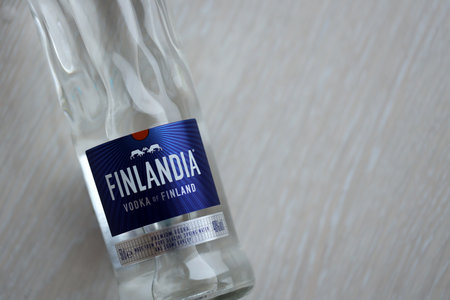 KYIV, UKRAINE - FEBRUARY 27, 2024 Bottle of famous Finlandia vodka alcohol drink on table close upのeditorial素材