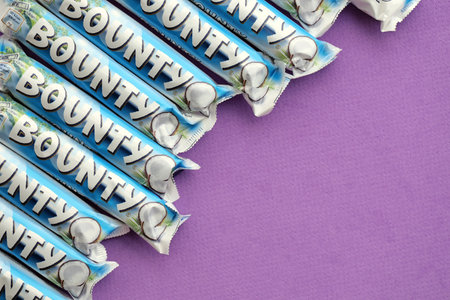 KYIV, UKRAINE - OCTOBER 31, 2023 Bounty chocolate bars with cocoa flavor filling. Bounty chocolate bar is a brand of American Mars Inc companyのeditorial素材