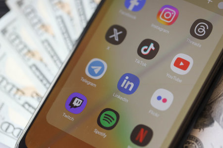 KYIV, UKRAINE - FEBRUARY 28, 2024 Social Media icons group on Galaxy A04s smartphone display on...