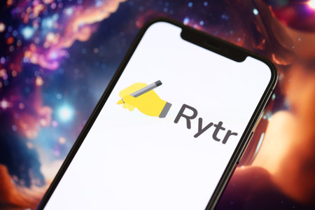 KYIV, UKRAINE - MARCH 17, 2024 Rytr logo on iPhone display screen with background of artificial...