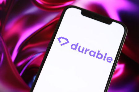 KYIV, UKRAINE - MARCH 17, 2024 Durable logo on iPhone display screen with background of artificial...
