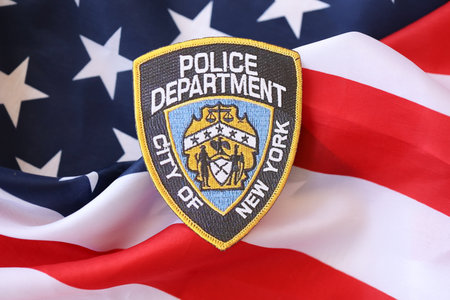 KYIV, UKRAINE - MARCH 9, 2024 US NYPD Police patch on United States of America flag close upのeditorial素材