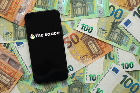KYIV, UKRAINE - FEBRUARY 23, 2024 The Sauce logo of famous dating website or app on iPhone display screen close upのeditorial素材