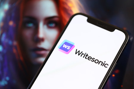 KYIV, UKRAINE - MARCH 17, 2024 Writesonic logo on iPhone display screen with background of artificial intelligence futuristic ai generated image close upのeditorial素材